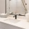a bathroom with a large mirror