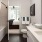 a bathroom with a tub toilet and sink