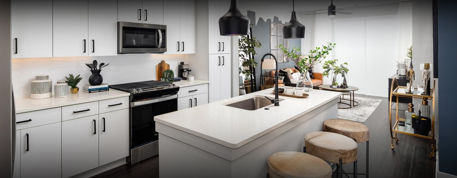 a kitchen with white cabinets