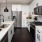 a kitchen with white cabinets