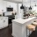 a kitchen with white cabinets